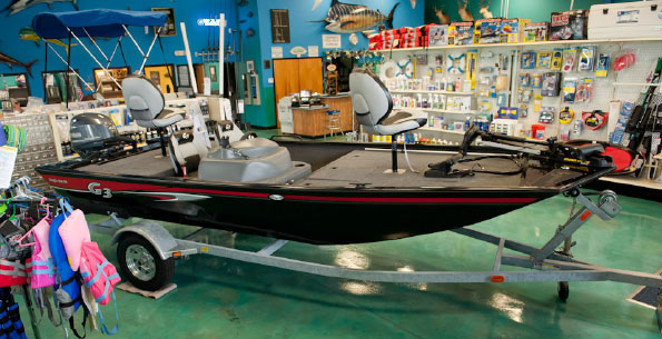 a g3 aluminum boat inside the dealership